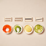 Modern kitchen vegetable cutter with easy-clean design and brush