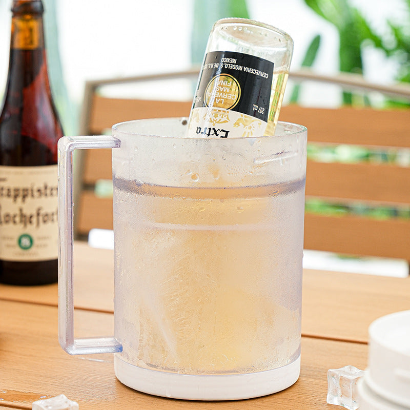 Portable cold press juicer making fresh orange juice at home
