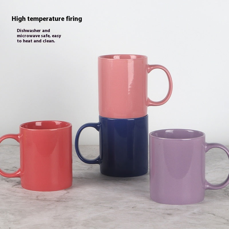 Front view of a simple bright ceramic mug, modern microwave safe coffee cup for everyday use