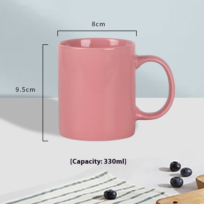 Close-up of the handle on a durable bright ceramic microwave safe coffee mug